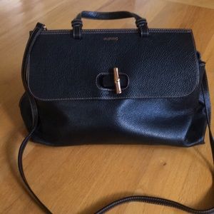 Valentino by Mario comes with the strap